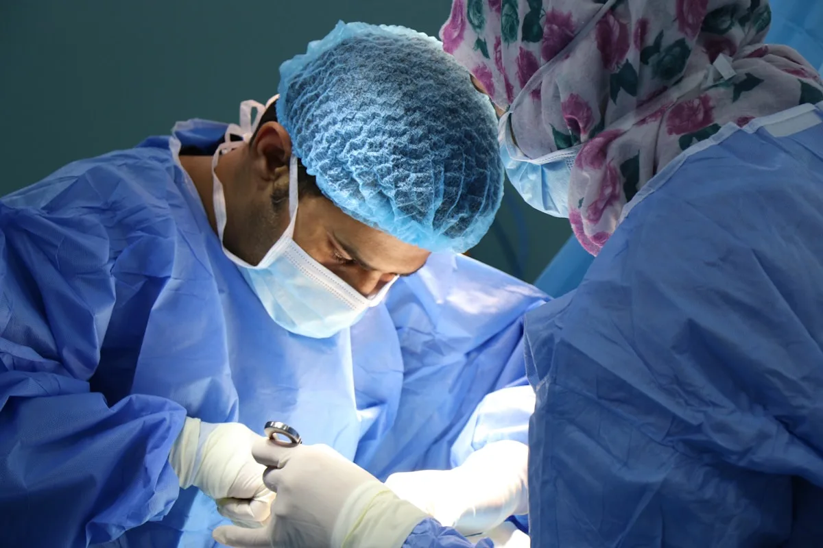 Spine surgeon consulting with patient